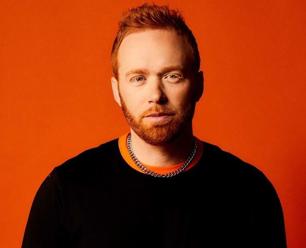 Sam Tinnesz, press photograph.